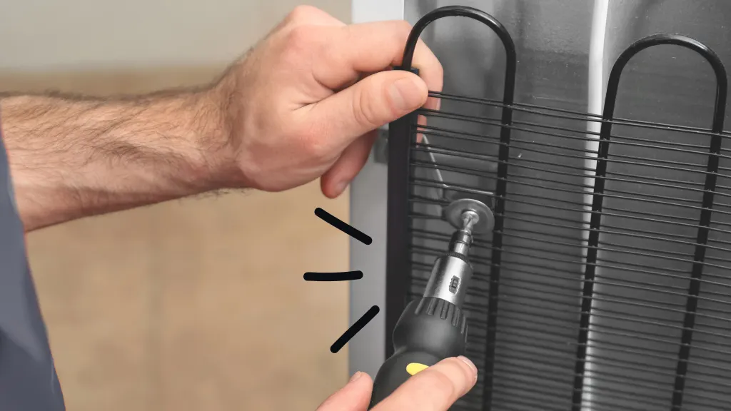 cleaning the condenser coils of a refrigerator