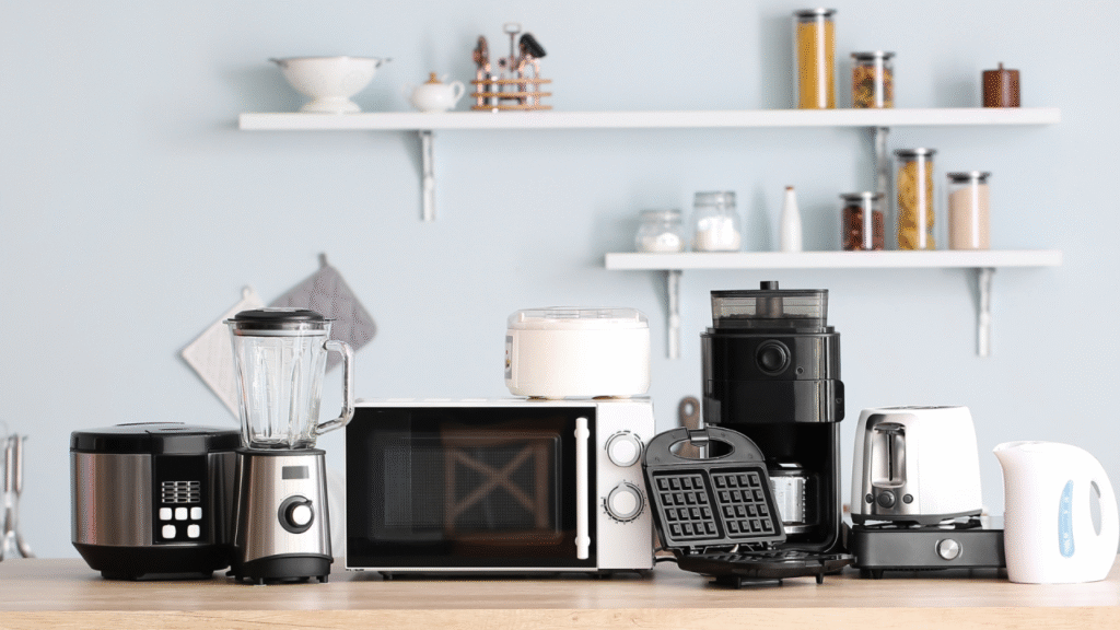 a variety of common small kitchen appliances arranged on a countertop