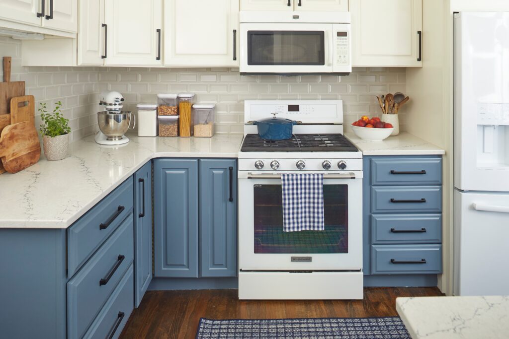 a kitchen with a two-toned color scheme