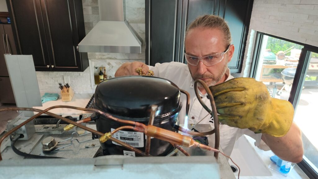 The steps outline how to test the start relay and observe the compressor's startup behavior to identify potential issues.