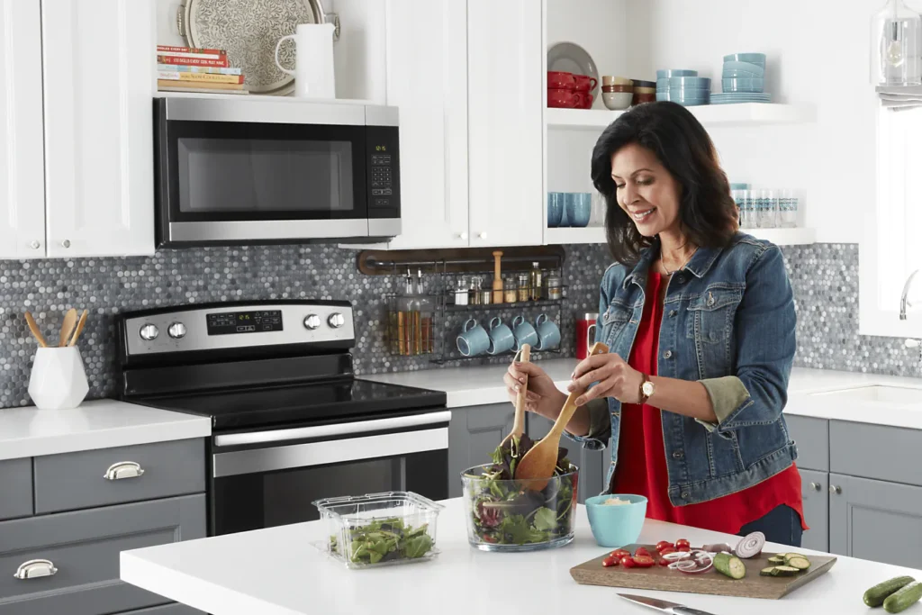 Pros and cons of over-the-range microwaves versus a separate countertop microwave and range hood setup for a compact kitchen.