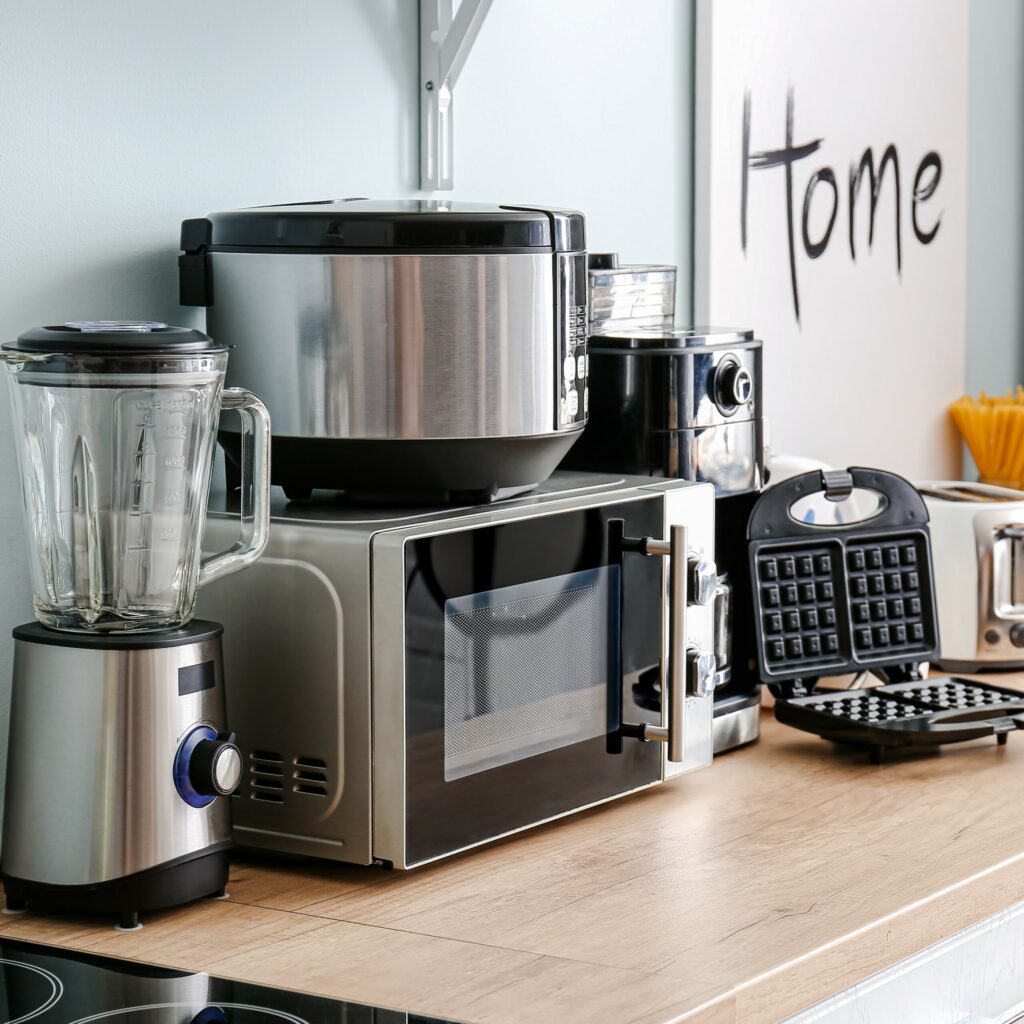 a collection of small kitchen appliances on a countertop