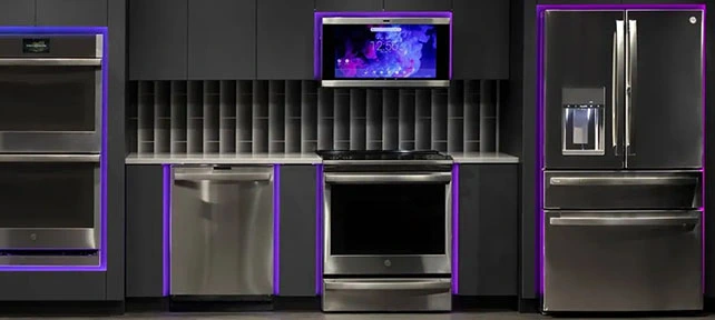 a modern kitchen featuring a suite of GE Profile smart appliances