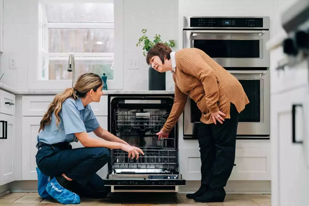 telling the issue of the dishwasher to the homeowner