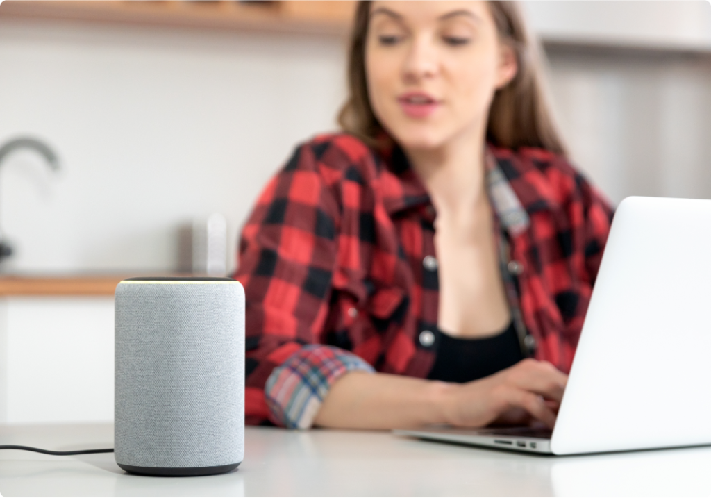 a girl using voice control appliance