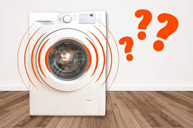 a front-load washing machine that appears to be experiencing a problem, such as making loud noises or shaking