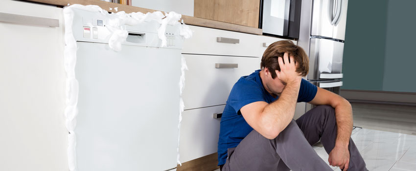 Leak due to issues like a damaged door gasket, loose or faulty door latch, or improper leveling