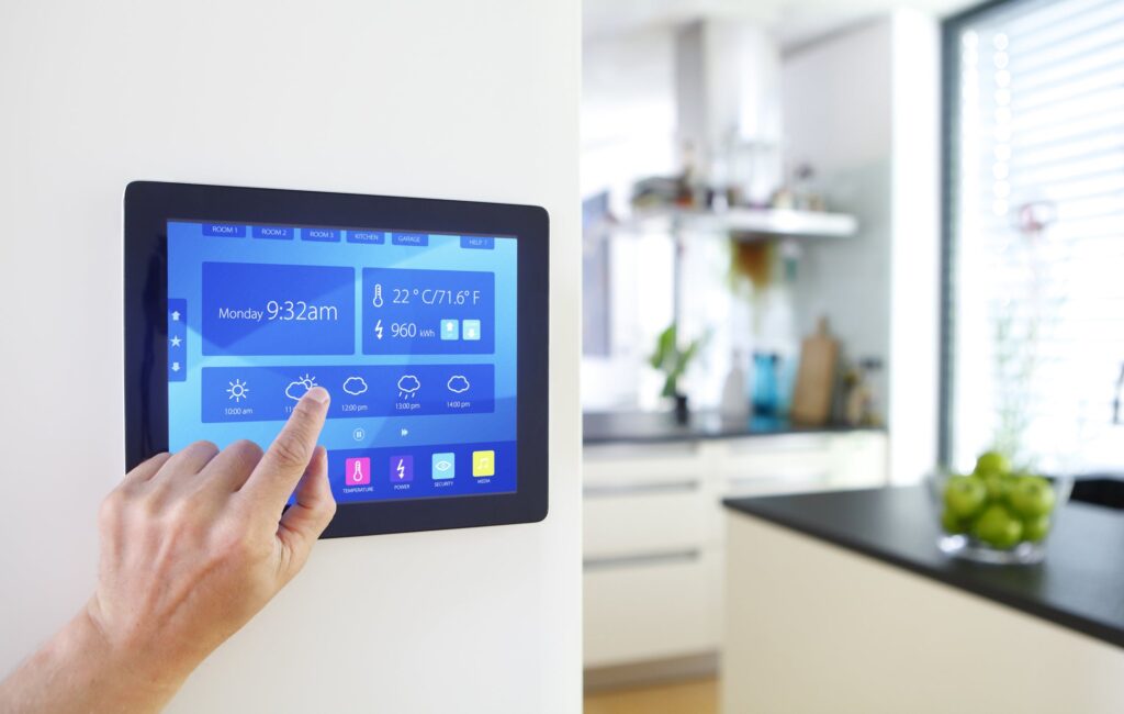 a user interacting with a smart home control panel