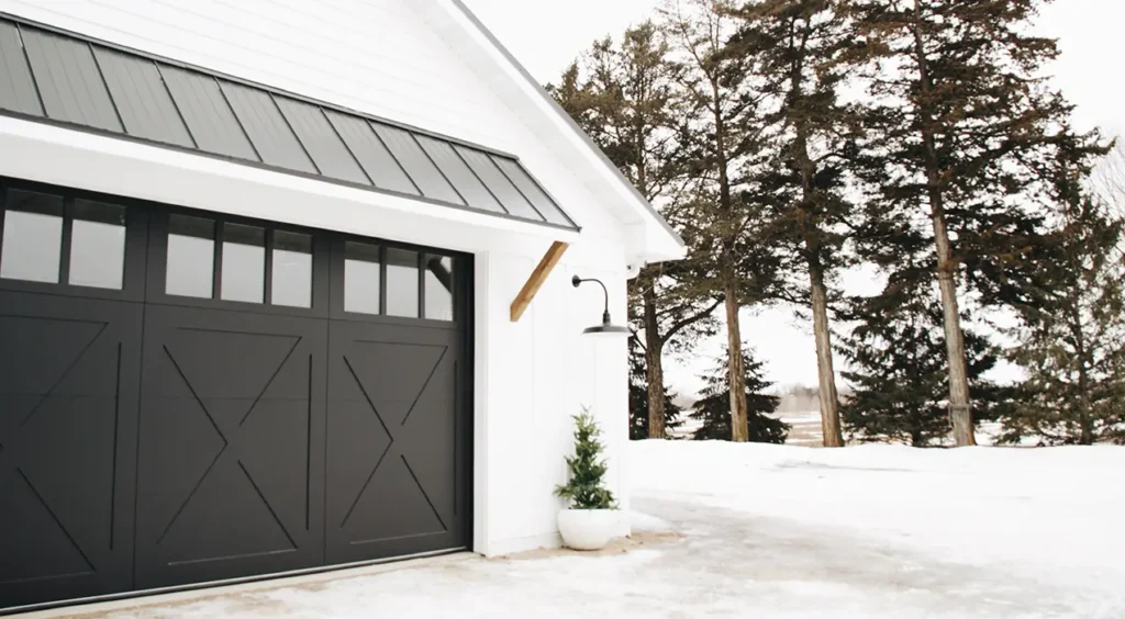 a black Clopay Reserve Wood Semi-Custom garage door