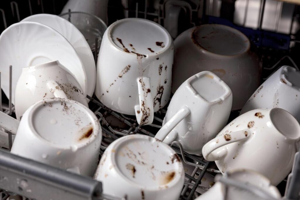 dirty white ceramic dishes